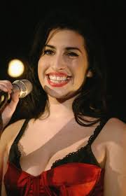 Amy photographed by Carrie Musgrave performing at the Mod Club in Toronto  in 2007. 🤍