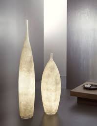 Inspired by peacock feathers, this transitional ceramic vase features a gorgeous textured teal and green finish base. Illuminated Floor Vases Lamp Unique Floor Lamps Floor Lamp