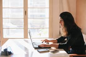 Select from premium women home office of the highest quality. Brunette Woman Working On A Laptop In Her Home Office By Veavea Stocksy United