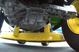 I read where you need to remove the differential cover.and that the fluid is so thick it takes hours to refill. Tuff Torq K46 Oil Maintenance General Information For Servicing Your Unit