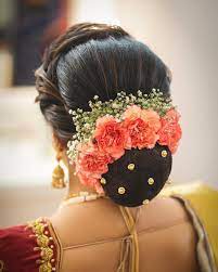 Latest Hairstyles For The Stunning Bride Weddingplz Indian Bride Hairstyle Engagement Hairstyles Indian Bun Hairstyles