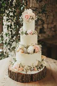 A Few Tier Iced Marriage Ceremony Wedding Cake Decorated With Clean Flowers Images By Virgin Floral Wedding Cakes Wedding Cake Decorations Wedding Cake Rustic
