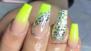 Acrylic nail designs can be created with a blend of matte black and shiny silver. Yellow Ombre Glitter Acrylic Nails Youtube