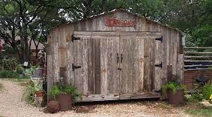 Enclosed This Metal Carport With Some Cool Old Reclaimed Wood Thank You Amy Hardy For The Sign It S P Metal Carports Timber Frame Building Carport Makeover