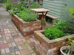 To build a raised vegetable garden box, first cut 4 pieces of 4x4 lumber for posts. 15 Raised Bed Garden Design Ideas
