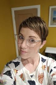 person considers multicolor hair dye after haircut