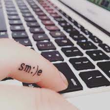 15 Tiny Tattoo Ideas That Are Beyond Dainty Tiny Finger Tattoos Tattoos Tiny Tattoos