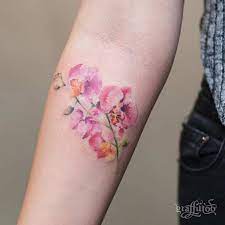 47 Breathtaking Watercolor Flower Tattoos Stayglam Watercolor Tattoo Flower Orchid Flower Tattoos Flower Tattoo Arm