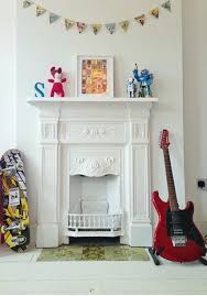 Or it can be a simple construction project, where you cover up the brick with drywall, wood, or tile. Victorian Fireplace Bunting Robots Guitar And Skateboard Boy S Room Victorian Bedroom Fireplace Victorian Bedroom Victorian Fireplace