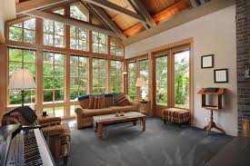 Wall Of Windows Design Walls Of Wood Encased Windows Integrate The Interior To The E Craftsman Home Interiors Pacific Northwest Style Interior Renovation