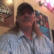 What is a durable power reclining couch in leather that can hold up to 4  large dogs?