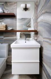 Unless you can hover, your floor is in constant use when you are home. Designer 1 2 3 Compact Condo Bathroom Renovation Huffpost Canada Style
