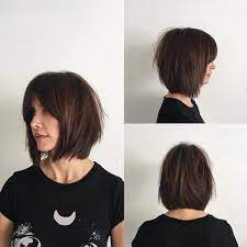 Rich Brunette Soft Layered Bob With Curtain Bangs And Undone Straight Texture Short Hair With Bangs Short Straight Hair Thick Hair Styles