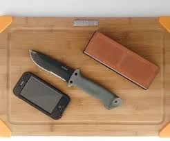 While the angle guide is stationary and doesn't ride along with the knife, it still acts as a helpful reminder of the angle you're trying to hold on each for anyone interested in whetstone sharpening who suspects they won't be pumping (kitchen) iron on a daily basis, having these little doodads. Knife Sharpening With A Whetstone An Easy Angle Guide For The Perfect Blade 3 Steps Instructables
