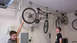Bicycle lift for garage available here are also equipped with heavy pressure technology joints for stable operations. How To Use Racor Pbh 1r Ceiling Mounted Bike Lift Youtube