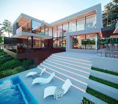 The modern minimalist architecture of the villa has been enhanced with rich textures and feels of the fabrics and the warm and bright tones of the gold metal that highlights the main areas of the open space ground floor it has accents of natural stones in key areas such as the waterfall. Modern Villa Design Interior Art Design Facebook