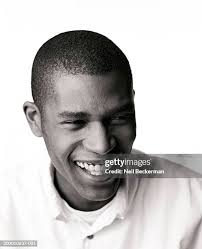 Young Man Smiling Portrait High-Res Stock Photo