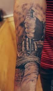 He is regarded as the incarnation of god by most christians.his teachings an example of living a more spiritual life. Amazing Hand Of Jesus Nailed Forearm Tattoo Tattooimages Biz