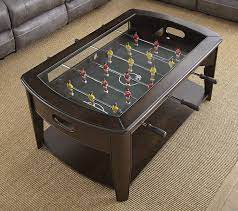 .for purchasing a football coffee table, as well as some of the best game tables on the market foosball coffee tables are not that expensive. Amazon Com Steve Silver Diletta Foosball Game Coffee Table With Casters In Walnut Furniture Decor