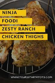 Ninja Foodi Chicken Thighs Tourist With Tots Recipe Chicken Thigh Recipes Recipes Ninja Cooking System Recipes Chicken