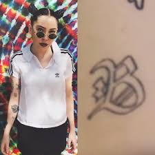 Blessed written in old english font on arm; 41 Celebrity Gothic Old English Tattoos Steal Her Style