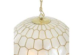We propose here some capiz shells from various diameters : Creative Co Op Capiz Honeycomb Globe Chandelier Pendant Light Capiz White Seashells With Antique Gold Ashley Furniture Homestore