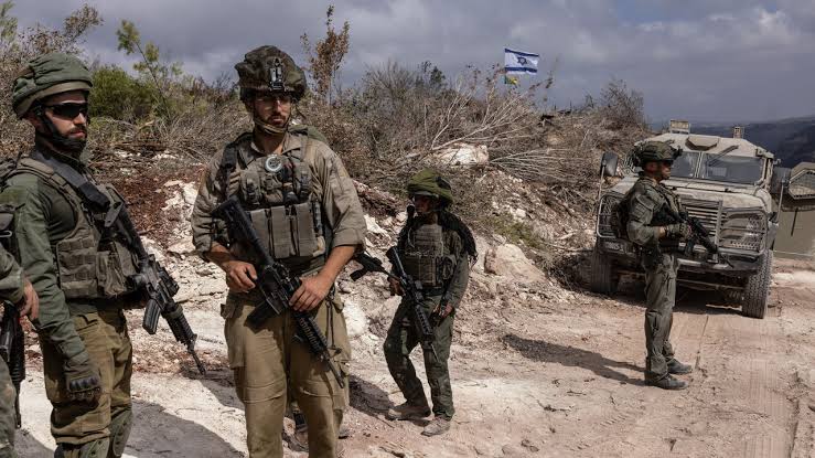 Just inside Lebanon, Israeli soldiers debate how far to go