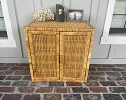 A new media console is a modern furniture solution that will keep the games, controllers, dvds, and recording equipment organized while maintaining your room's style. Rattan Tv Table Etsy