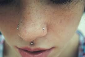Double Nostril On One Side Single Nostril On The Other And Then A Medusa Cute Piercings Double Nose Piercing Facial Piercings