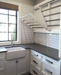 inspiration from the street of dreams inspired room laundry remodel design cubby shelf with hooks