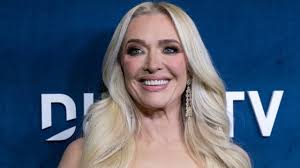 Olivia Holt in Two-Piece Workout Gear Visits Disney