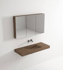 A dark chestnut effect wood finish combines beautifully with soft corners and a tapered design to bring you the very latest in contemporary storage for your bathroom. Solid Single Wooden Basin Architonic
