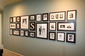 Black And White Photo Wall Ideas I Actually Really Like This Especially With The Family Letter In The Mix Display Family Photos Picture Hanging Wall Gallery