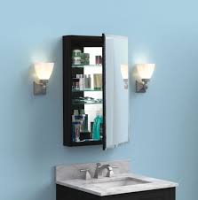 A framed medicine cabinet makes a distinct statement in any bathroom. Metal Medicine Cabinet 15 X 36 In Black Foremost Bath