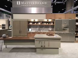 Decora Cabinetry Introduces A New Stain Gunny A Mid Tone Cooler Brown Pictured On Wall Cabinets In Upper Right Thi Stylish Kitchen Kitchen Design Cabinet