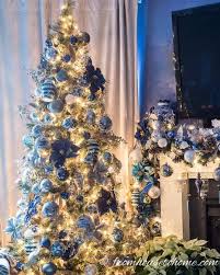 Blue and gold christmas ornaments on wooden background. Blue White And Gold Christmas Tree Decor Plus 40 Bloggers Christmas Trees