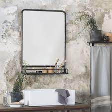 You can put it above the vanity or perhaps basin. Large Black Industrial Mirror With Shelf By The Little House Shop Industrial Mirrors Industrial Bathroom Mirrors Bathroom Mirror With Shelf