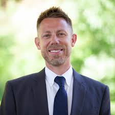 News Flash • Community Development Partners with QLess to Re