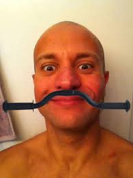 What can make me look better with a handlebar mustache?