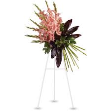 Just click on most images on this site to enlarge them and see their credit source. Elegant Tribute Spray By Teleflora In Wickenburg Az Crissman S Flower Barn