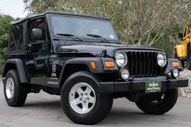 Image result for Brilliant Black 2004 Jeep
