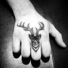 The images include a middle finger, chefs knife. Top 30 Finger Tattoos For Men