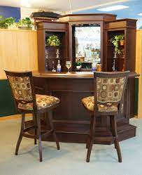This wine table has hooks for your wine glasses that dangle beneath the left and right side of the tabletop, giving you storage for at least 12 glasses. Living Room Mini Bar Small Home Bar Ideas Novocom Top