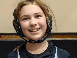 VIDEO: 7th grader makes history at South Dakota high school state wrestling  tournament