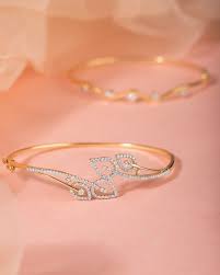 Brace Let Yourselves It S Raining Diamonds Because Thegreatdiamondfestival Is On Go To Diamond Bracelet Design Gold Ring Designs Gold Bangles Design