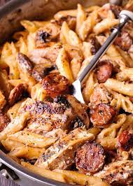 Spicy cajun seasoned chicken, tons of veggies, and a creamy sauce. Creamy Cajun Chicken And Sausage Pasta What S In The Pan Cajun Chicken Pasta Recipes Italian Chicken Pasta Recipes Chicken Dinner Recipes