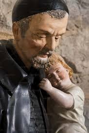 St. Vincent de Paul carrying a child