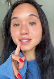 Girl Cutting Her Eyelashes