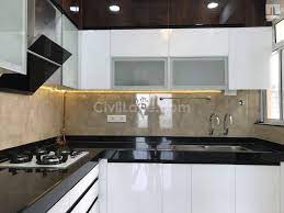 Luxurious glass finish modular kitchen. Types Of Finishes In Modular Kitchen Civillane
