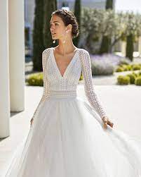 Traumhafte vintage brautkleider für kreative und selbstbewusste frauen, die ihre individuelle, natürliche seite zeigen wollen. Langarm Brautkleid Pearl Fashion Group